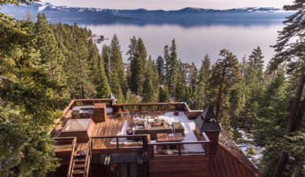 Arial view of outdoor grill and seating on roof overlooking lake tahoe